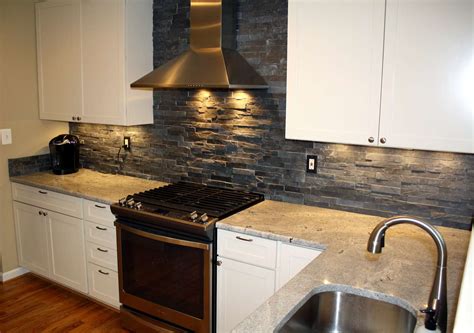 granite backsplash with tile above.